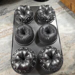 Nordic Ware Bundt Quartet Pan - 6 Cup Cast Aluminum Multi-Design Cake Pan